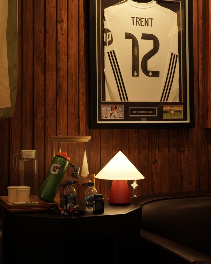 NOLA lamp on a desk in a personal lounge corner